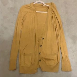 yellow cardigan